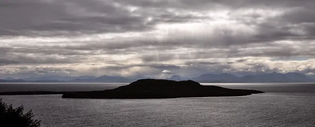 The view across to the Highlands of north western Scotland from the north of Skye