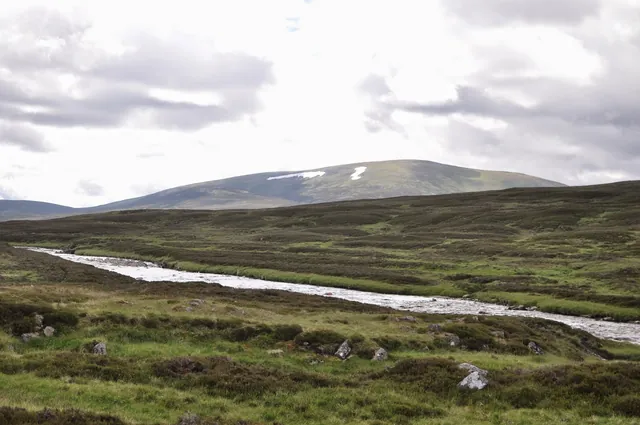 Snow still on the hills in late June