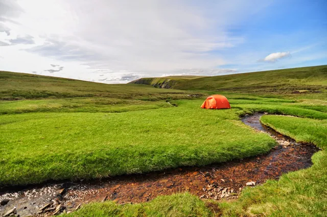 Doesn't get much better than that folks. Camp on lush grass with nearby stream at 930m