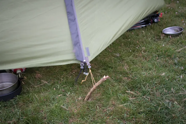 40mph gusting winds with some shelter camped behind St. Catherine's Tor. Bootlace guy ropes had to be deployed for extra tent stability, and extra pegs made out of gorse bush branch