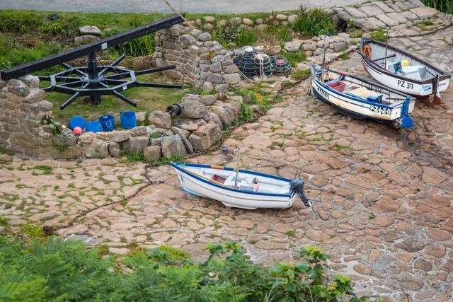 Boats in Penberth Cove - the old capstan machine is classic