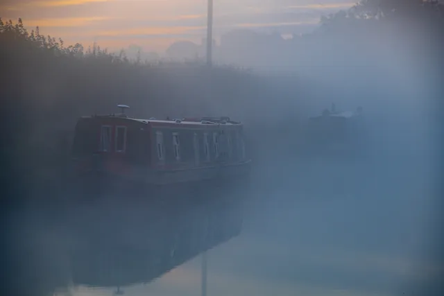 Our 69ft boat shrowded in mist - spooky. Nice and quiet though