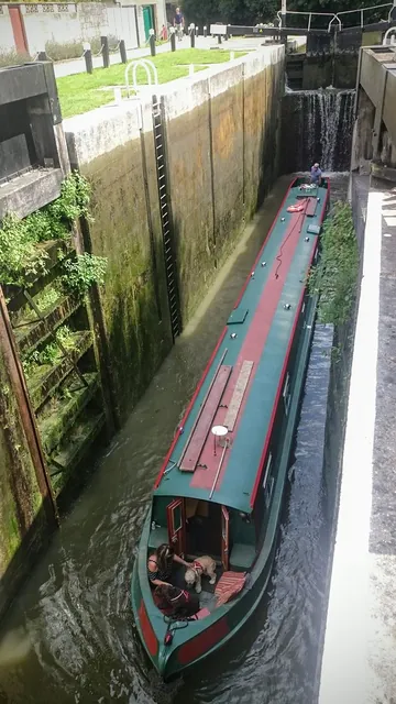 Mike is finally satisfied with the length of a boat! A 69 year old in a 69 ft boat exiting Bath Deep Lock, Britain's second deepest lock at 5.92m