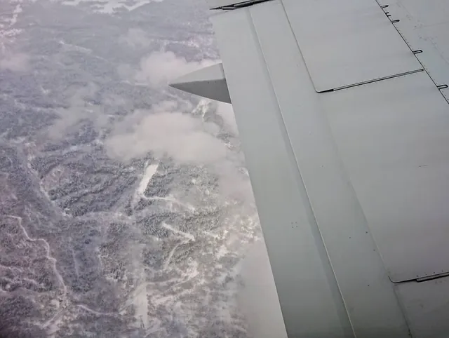 Flying over snowy Hokkaido and looking down on similar playground terrain that we'll be tearing up from tomorrow