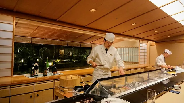 Takeshi at work on the sushi bar