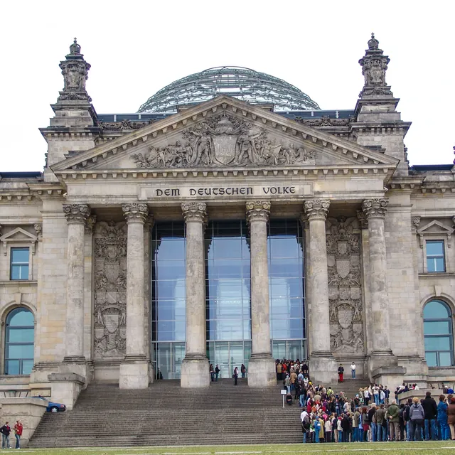 The inscription reads 'To the German people' on the front of their parliament building