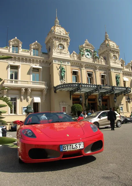 Ferrari 430 parked up next to us as we drink 10 pound pints of beer in Le Cafe de Paris - opulence defined!