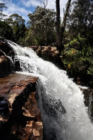 If you wade across the river (slippy rocks) then you can get a great side-profile of the falls