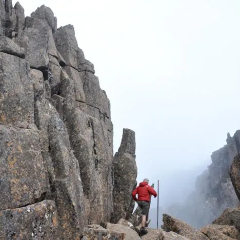 Ed striding forward into what looks like the unknown