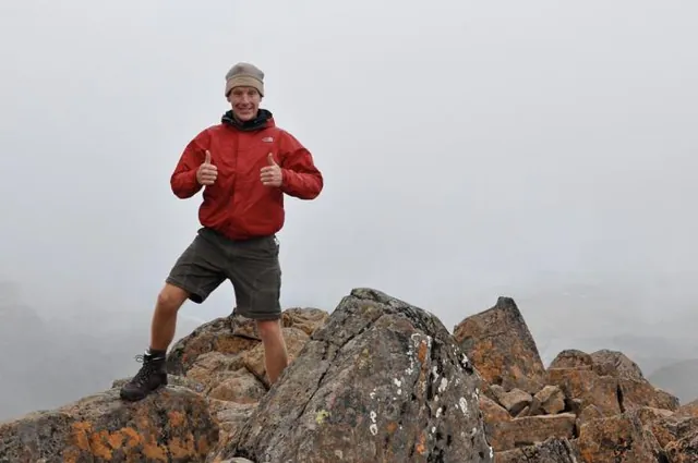 Ed pleased with our first mountain summit along the track