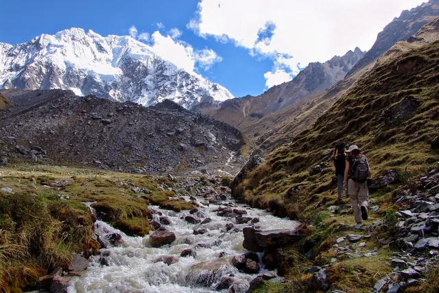 We approach the huge grey moraines of rock and gravel deposited by the glaciers