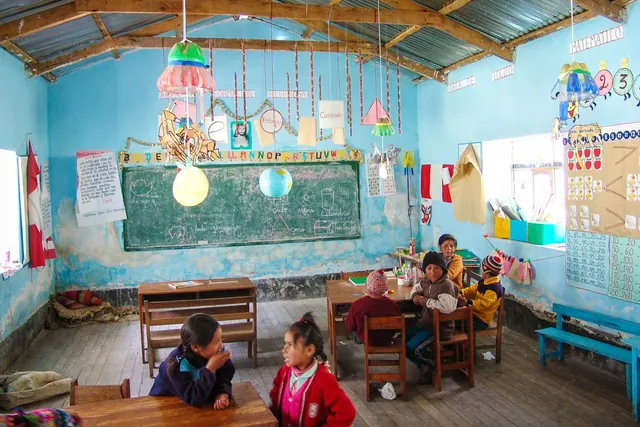 We pay a visit to a local school along the way ... the teacher has to walk for one day to get here