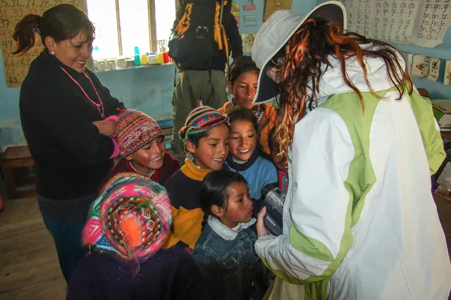 Gill shows the kids a video of themselves singing ... a first time experience for a lot of them