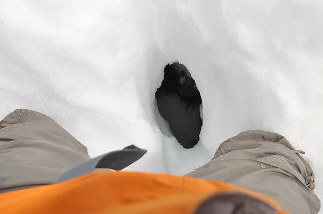 Some deep holes in the snow to be careful of