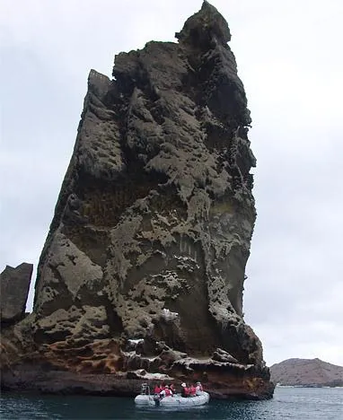 Getting a close-up view of Pinnacle Rock in the panga boat