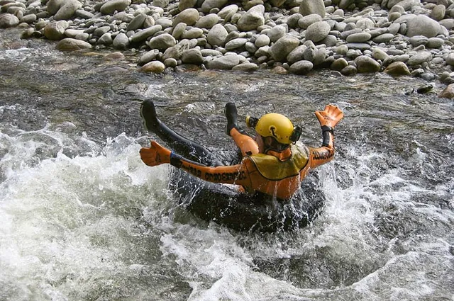 Gill unable to straighten herself for the Howie rapids action shot