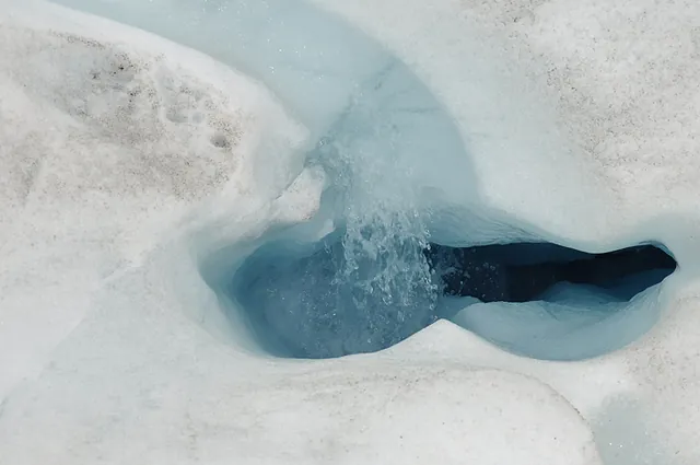 The melting water plays a key part in helping the glacier slip down the mountain
