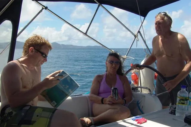 Darrell consulting the Whitsundays bible - '100 Magic Miles'