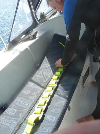 Mike preparing an unbelievable amount of weight for his Hayman Island dive