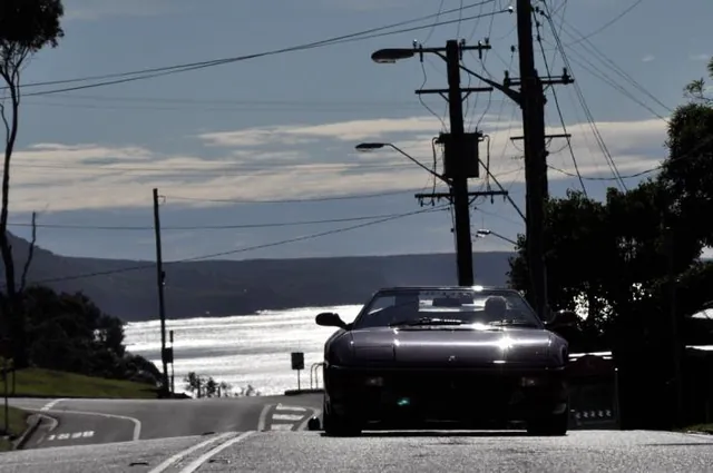 The F355 and the coastline behind ... which is the more beautiful?