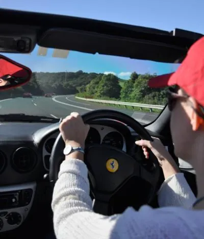You get a real feeling of 'Gumball Rally' as you race along with four other Ferraris